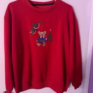 Vintage Christmas sweater with a cute teddy bear detail.